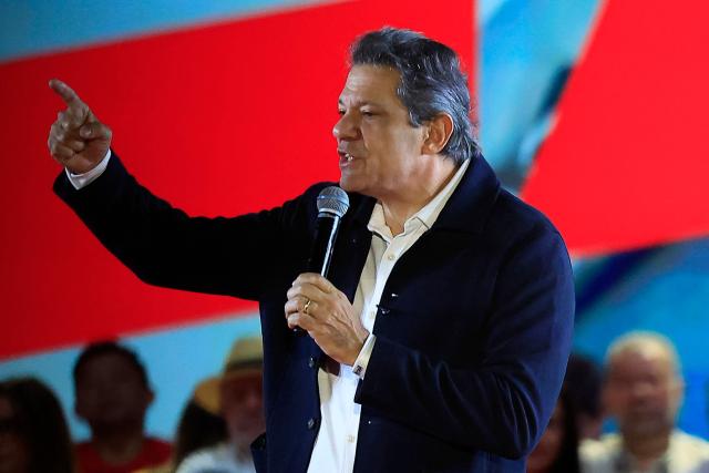 Brazil's Finance Minister Fernando Haddad speaks during the Workers' Party (PT) national convention in Sao Paulo, Brazil, on August 2, 2026, where Lula formally announces his bid for re-election. At 80, President Lula on July 2 launches his bid for re-election, casting himself as a defender of Brazil's "sovereignty" as pressure from President Donald Trump's administration casts a shadow over the campaign. (Photo by Miguel SCHINCARIOL / AFP)