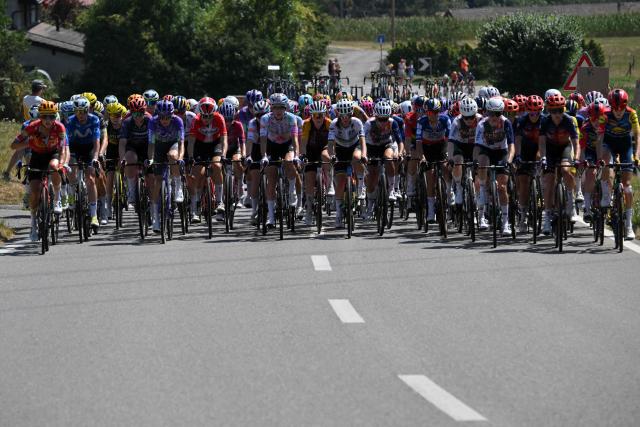 The pack rides during the second (out of 9) stage of the fifth edition of the Women's Tour de France cycling race, 147.9 km from Aigle to Geneva, in Aigle on August 2, 2026. (Photo by Nicolas TUCAT / AFP)