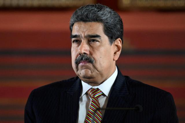 (FILES) Venezuela's President Nicolas Maduro looks on during a meeting at the National Assembly in Caracas on August 22, 2025. Ousted Venezuelan President Nicolas Maduro, who was captured by the US military in early January 2026, “welcomed” on August 2, 2026, from his prison in New York “any path toward dialogue,” as the government and the opposition are set to begin talks next week, under US supervision, that many hope will lead to a political transition and elections. (Photo by Juan BARRETO / AFP)