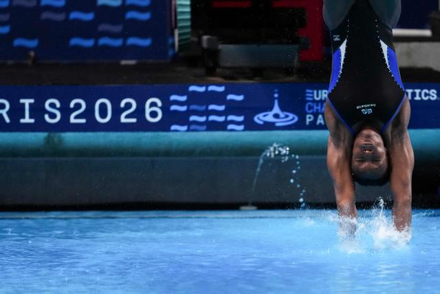 Britain's diver Desharne Bent-Ashmeil competes in the women’s 1m springboard diving final event during the LEN European Aquatics Championships, at the Olympic Aquatics Centre in Saint-Denis, northeastern suburbs of Paris, on August 2, 2026. (Photo by Dimitar DILKOFF / AFP)