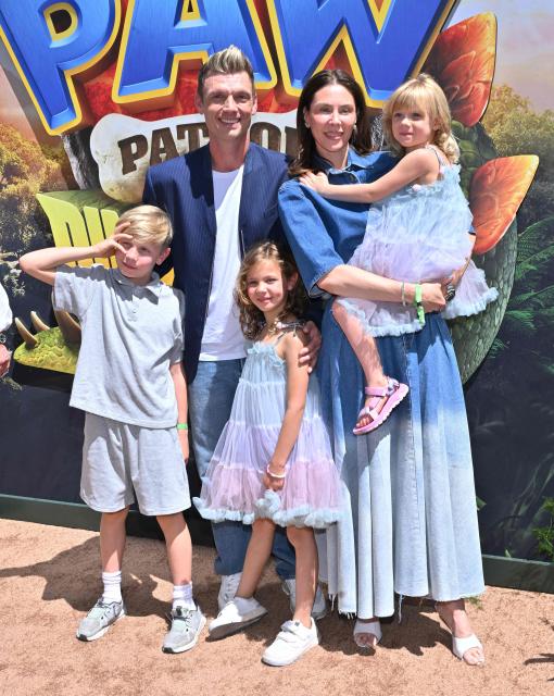US singer Nick Carter and Lauren Kitt Carter with their children attend Paramount's global premiere of "Paw Patrol: The Dino Movie" at the Paramount Theater in Los Angeles on August 2, 2026. (Photo by LISA O'CONNOR / AFP)