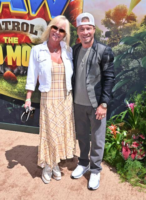 US singer Brian Littrell and Leighanne Littrell attend Paramount's global premiere of "Paw Patrol: The Dino Movie" at the Paramount Theater in Los Angeles on August 2, 2026. (Photo by LISA O'CONNOR / AFP)