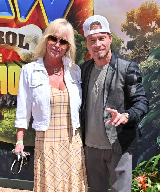 US singer Brian Littrell and Leighanne Littrell attend Paramount's global premiere of "Paw Patrol: The Dino Movie" at the Paramount Theater in Los Angeles on August 2, 2026. (Photo by LISA O'CONNOR / AFP)