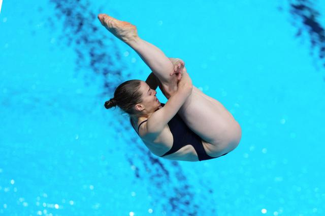 Switzerland's diver Michelle Luisa Heimberg competes in the women’s 1m springboard diving final event during the LEN European Aquatics Championships, at the Olympic Aquatics Centre in Saint-Denis, northeastern suburbs of Paris, on August 2, 2026. (Photo by Dimitar DILKOFF / AFP)