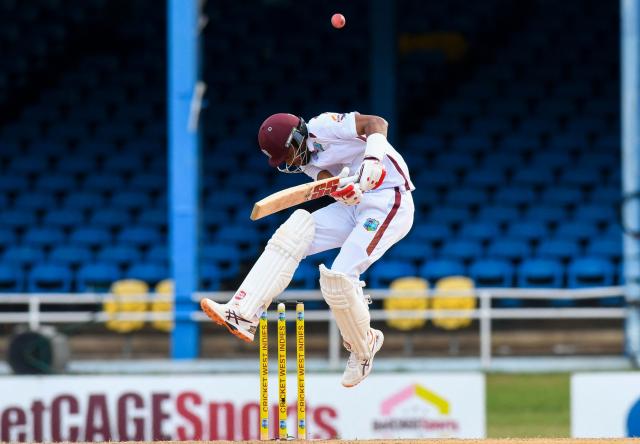 Roston Chase of West Indies takes evasive action from a Mohammad Ali of Pakistan delivery during the first day of the second Test match between West Indies and Pakistan at Queen's Park Oval in Port of Spain, Trinidad and Tobago, on August 2, 2026. (Photo by Randy Brooks / AFP)