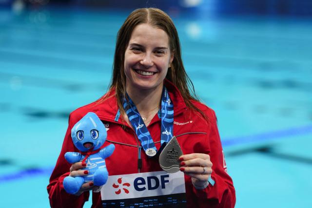 Silver medallist Switzerland's diver Michelle Luisa Heimberg, poses after the women’s 1m springboard diving final event during the LEN European Aquatics Championships, at the Olympic Aquatics Centre in Saint-Denis, northeastern suburbs of Paris, on August 2, 2026. (Photo by Dimitar DILKOFF / AFP)