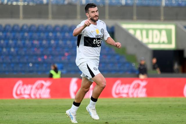 Olimpia's New Zealander player Tim Payne celebrates after scoring on his debut in the Paraguayan league during the Clausura tournament football match between Olimpia and Rubio Nu, at the Defensores del Chaco stadium in Asuncion, on August 2, 2026. (Photo by AFP)