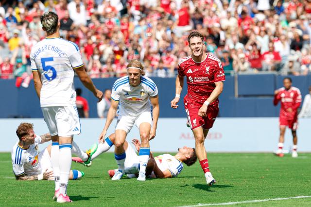 Liverpool's German midfielder #07 Florian Wirtz celebrates after scoring during the first half of the pre-season friendly football match between Liverpool FC and Leeds United FC at Soldier Field in Chicago, Illinois, on August 2, 2026. (Photo by KAMIL KRZACZYNSKI / AFP)