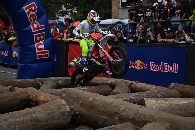 Colombian rider Camilo Dorado competes during the first enduro race held through the streets of the city at the Red Bull Moto Urbano event in Bogota on August 2, 2026. (Photo by Raul ARBOLEDA / AFP)