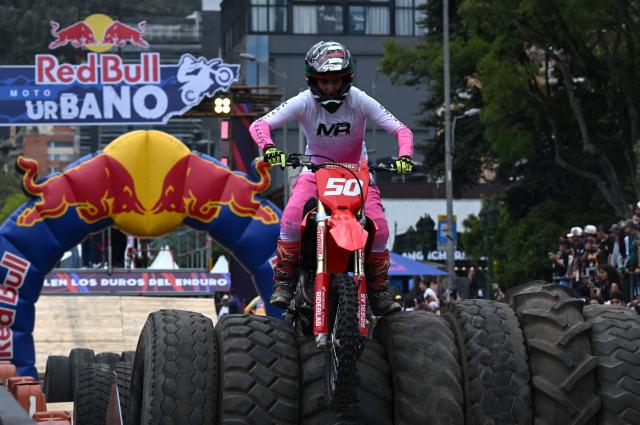 Colombian rider Martin Varela competes during the first enduro race held through the streets of the city at the Red Bull Moto Urbano event in Bogota on August 2, 2026. (Photo by Raul ARBOLEDA / AFP)