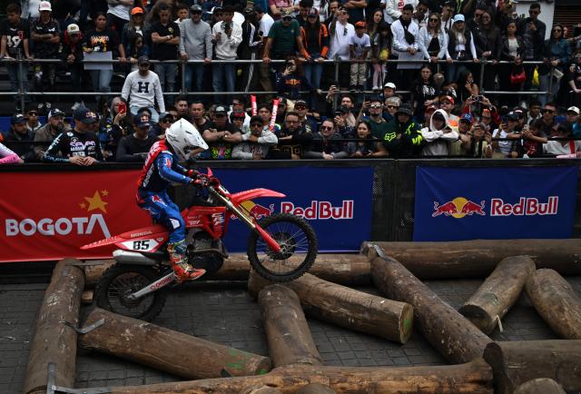 Colombian rider Tomas Jaramillo competes during the first enduro race held through the streets of the city at the Red Bull Moto Urbano event in Bogota on August 2, 2026. (Photo by Raul ARBOLEDA / AFP)