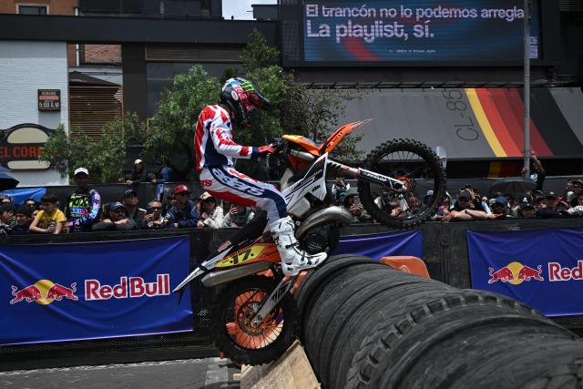 Colombian rider Francisco Alvarez competes during the first enduro race held through the streets of the city at the Red Bull Moto Urbano event in Bogota on August 2, 2026. (Photo by Raul ARBOLEDA / AFP)