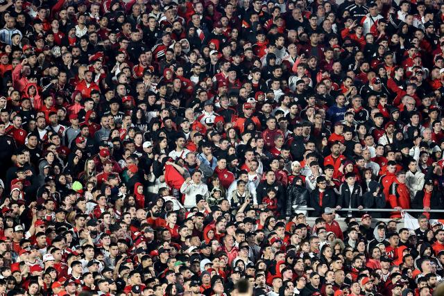 Fans of River Plate fans cheer for their team during the Argentine Professional League 2026 Clausura football match  between River Plate and Rosario Central at MAS Monumental stadium in Buenos Aires on August 2, 2026. (Photo by Alejandro PAGNI / AFP)