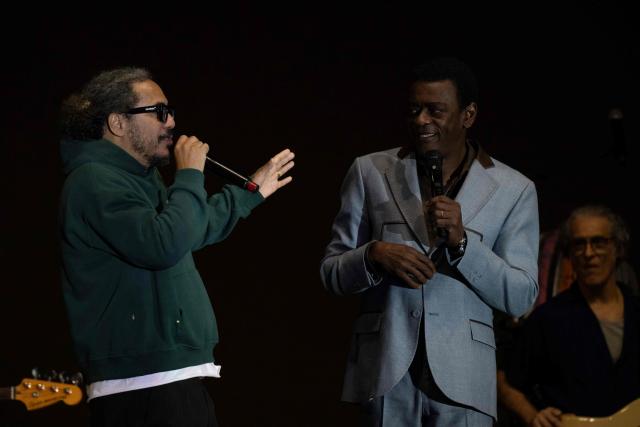 Brazilian singers Marcelo D2 (L) and Seu Jorge perform during the Rio 2026 Winter Festival at Marina da Gloria in Rio de Janeiro, Brazil on August 2, 2026. (Photo by Pablo PORCIUNCULA / AFP)