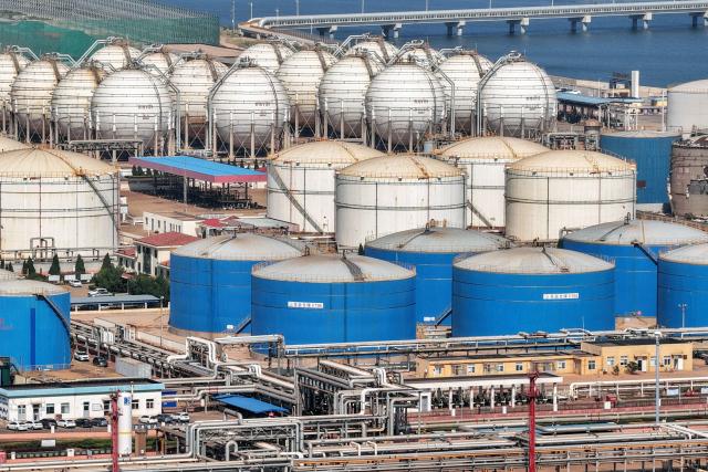 Tanks are seen at a Sinopec Company oil and LNG storage and transportation base in Longkou, Shandong province, eastern China, on August 2, 2026. (Photo by CN-STR / AFP) / China OUT