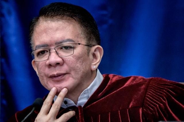 Senator Francis Escudero sits as the presiding officer during the impeachment trial of Philippine Vice President Sara Duterte at the Senate of the Philippines in Pasay, Metro Manila on August 3, 2026.  (Photo by Ezra Acayan / POOL / AFP)