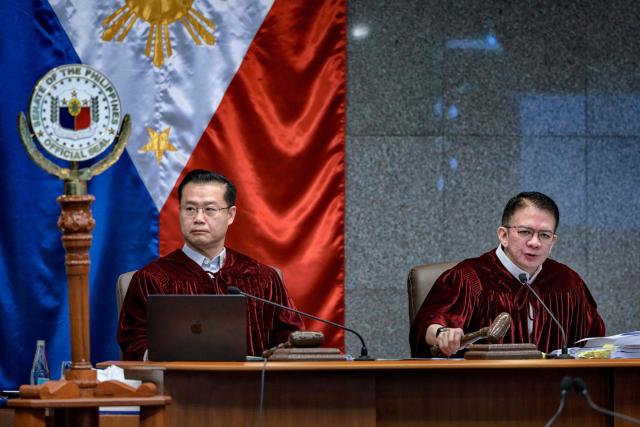 Senate President Sherwin Gatchalian (left) and Senator and Presiding Officer Francis Escudero sit as senator judges during the impeachment trial of Philippine Vice President Sara Duterte at the Senate of the Philippines in Pasay, Metro Manila on August 3, 2026.  (Photo by Ezra Acayan / POOL / AFP)