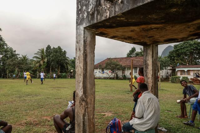 Residents play football in Monte Alegre, near Santo Antonio, in Príncipe Island in São Tomé and Príncipe, on August 2, 2026. Situated in the northwestern part of Príncipe Island, Monte Alegre (also known as Montalegre) is a historic former plantation (roça) and natural landmark featuring a scenic hiking trail and waterfall located in the northwest of Príncipe Island. (Photo by Daniel BELOUMOU OLOMO / AFP)