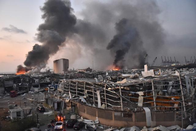 EDITORS NOTE: Graphic content / (FILES) This picture taken on August 4, 2020 shows a general view of the scene of an explosion at the port of Lebanon's capital Beirut. Lebanese President Joseph Aoun on August 3, 2026 urged the judiciary to issue a long-awaited indictment over the 2020 Beirut port blast, on the eve of the catastrophe's sixth anniversary. (Photo by AFP)