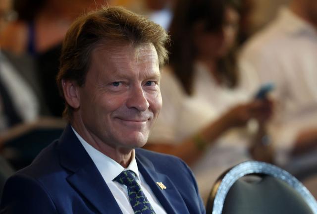 Reform UK deputy Leader Richard Tice smiles before Reform UK leader Nigel Farage and the party's head of policy, Zia Yusuf, attend a press conference at a hotel in central London on August 3, 2026. (Photo by Toby Shepheard / AFP)