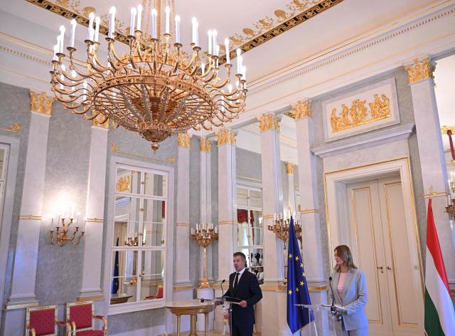 Hungary's Prime Minister Peter Magyar informs the press with the Speaker of the Hungarian Parliament Agnes Forsthoffer (R) at the presidential palace in Budapest, on August 3, 2026 on the government's handling of the heat wave and the energy crisis. (Photo by Attila KISBENEDEK / AFP)