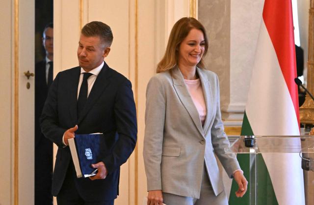 Hungary's Prime Minister Peter Magyar (L) arrives to inform the press with the Speaker of the Hungarian Parliament Agnes Forsthoffer at the presidential palace in Budapest, on August 3, 2026 on the government's handling of the heat wave and the energy crisis. (Photo by Attila KISBENEDEK / AFP)