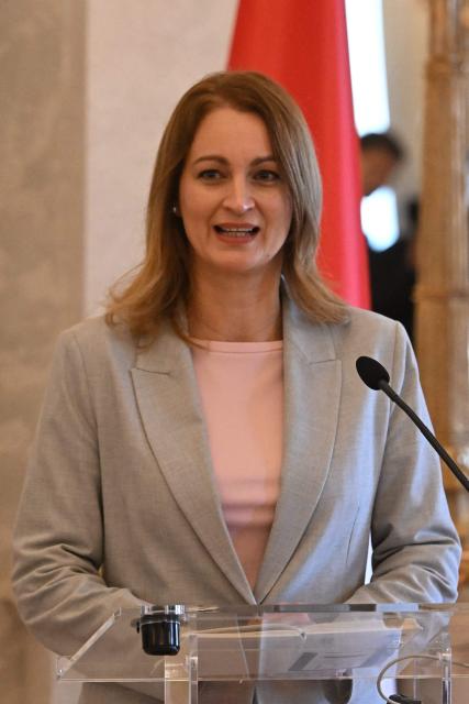 Speaker of the Hungarian Parliament Agnes Forsthoffer informs the press with Hungary's Prime Minister at the presidential palace in Budapest, on August 3, 2026 on the government's handling of the heat wave and the energy crisis. (Photo by Attila KISBENEDEK / AFP)