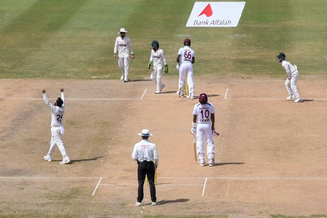 Ali Usman (L) of Pakistan celebrates the dismissal of Justin Greaves (4L) of West Indies during the 2nd day of the 2nd Test match between West Indies and Pakistan at Queens Park Oval, Port of Spain, Trinidad and Tobago, on August 03, 2026. (Photo by Randy Brooks / AFP)
