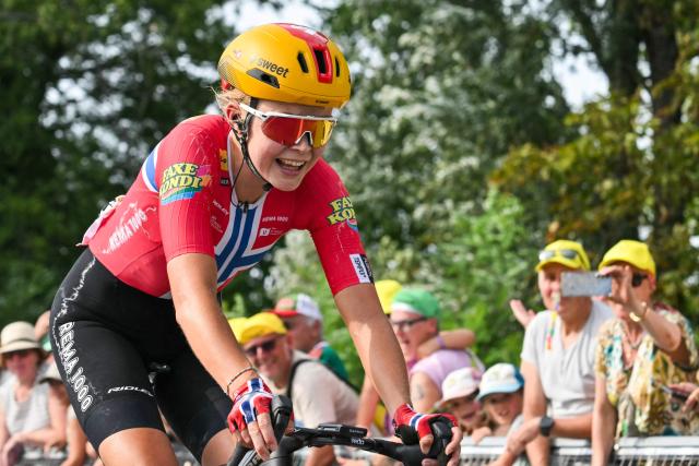 Uno-X Mobility's Norwegian rider Sigrid Ytterhus Haugset celebrates as she crosses the finish line to win the 3rd (out of 9) stage of the fifth edition of the Women's Tour de France cycling race, 156.5 km from Geneva to Poligny, in Poligny, central-eastern France on August 3, 2026. (Photo by NICOLAS TUCAT / AFP)