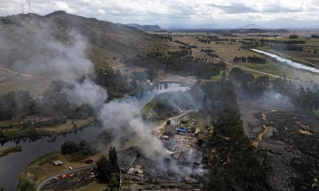 Aerial view showing a wildfire amid high temperatures in Sibate, near Bogota, Colombia, on August 3, 2026. (Photo by Raul ARBOLEDA / AFP)