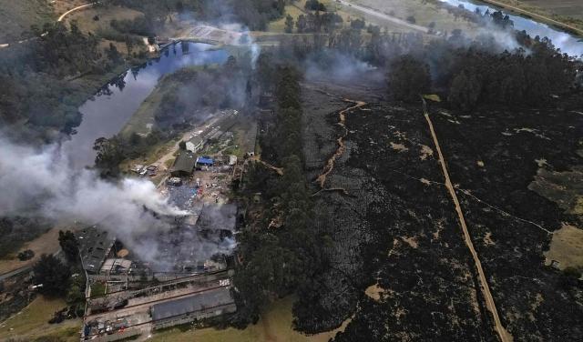 Aerial view showing a wildfire amid high temperatures in Sibate, near Bogota, Colombia, on August 3, 2026. (Photo by Raul ARBOLEDA / AFP)