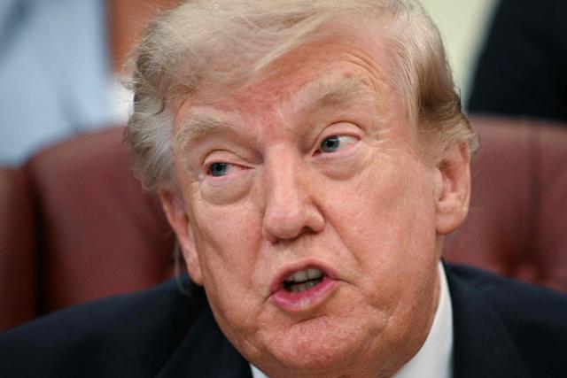US President Donald Trump speaks before signing an executive order in the Oval Office of the White House in Washington, DC, on August 3, 2026. (Photo by Jim WATSON / AFP)