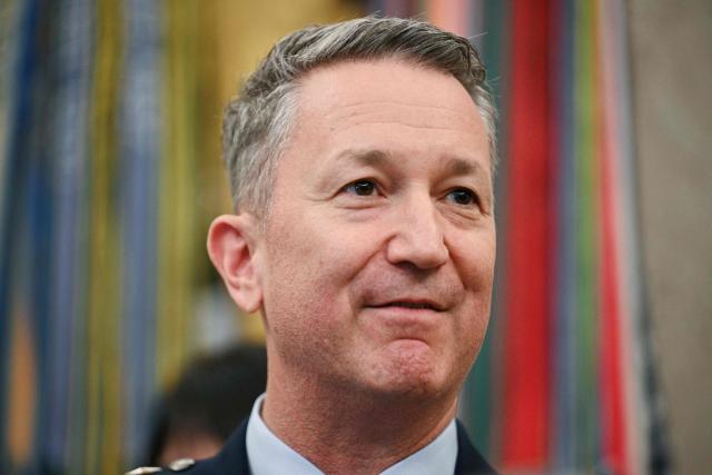 US Chairman of the Joint Chiefs of Staff Gen. Dan Caine looks on before President Donald Trump signs an executive order in the Oval Office of the White House in Washington, DC, on August 3, 2026. (Photo by Jim WATSON / AFP)