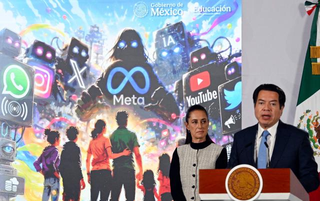 Secretary of Public Education Mario Delgado speaks next to Mexico’s President Claudia Sheinbaum during the daily press conference at the National Palace in Mexico City on August 3, 2026. (Photo by Alfredo ESTRELLA / AFP)