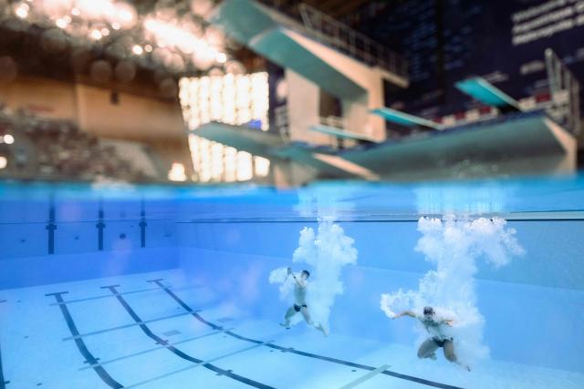 Britain's divers Anthony Harding and Jack Laugher compete in the men’s 3m springboard synchro final diving event during the LEN European Aquatics Championships, at the Olympic Aquatics Centre in Saint-Denis, northeastern suburbs of Paris, on August 3, 2026. (Photo by SEBASTIEN BOZON / AFP)