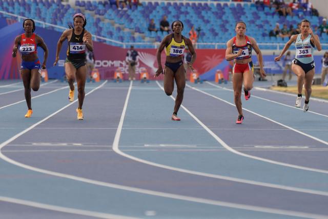 (L to R) Cuba's Yunisleidy Garcia, Jamaica's Natasha Morrison, Colombia's Maria Maturana, Antigua and barbuda's Geolyna Dowdy and Guatemala's Mariandree Chacon compete in the women's 100m semifinal, heat 2, during the XXV Central American and Caribbean Games at the Felix Sanchez Olympic Stadium in Santo Domingo on August 3, 2026. (Photo by Francesco SPOTORNO / AFP)