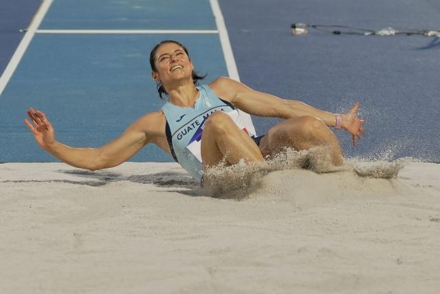 Guatemala's Thelma Fuentes competes in the women's triple jump final event during the XXV Central American and Caribbean Games at the Felix Sanchez Olympic Stadium in Santo Domingo on August 3, 2026. (Photo by Francesco SPOTORNO / AFP)