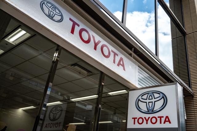 Toyota logos are seen on the side of a store in Tokyo on August 4, 2026. (Photo by Philip FONG / AFP)