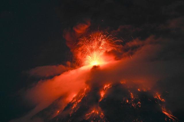 The Fuego volcano erupts 65 kilometers southwest of Guatemala City on August 3, 2026. On Monday, Guatemalan authorities declared a “danger” alert, the second-highest level, due to a powerful eruption of the Fuego volcano, and began evacuating nearby hamlets. (Photo by Johan ORDONEZ / AFP)