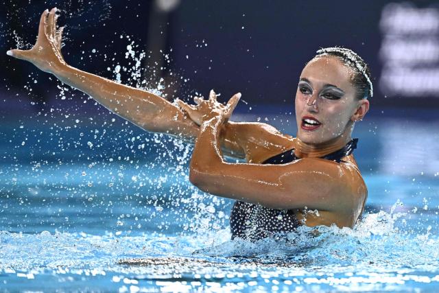 Italy's artistic swimmer Enrica Piccoli competes in the women’s solo technical artistic swimming final event during the LEN European Aquatics Championships, at the Olympic Aquatics Centre in Saint-Denis, northeastern suburbs of Paris, on August 4, 2026. (Photo by JULIEN DE ROSA / AFP)