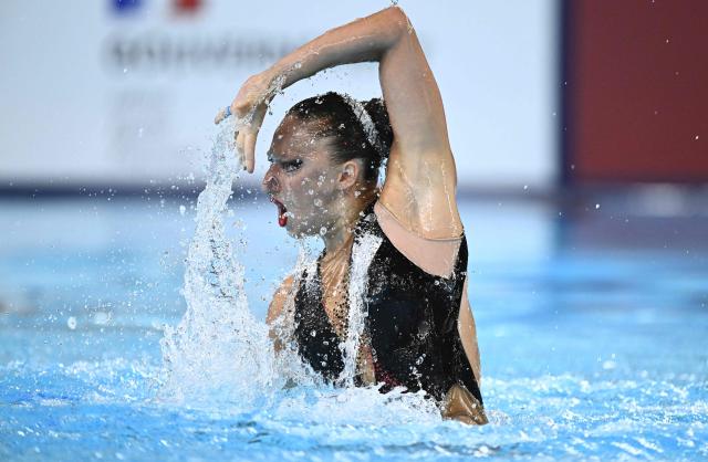 Georgia's artistic swimmer Maria Alavidze competes in the women’s solo technical artistic swimming final event during the LEN European Aquatics Championships, at the Olympic Aquatics Centre in Saint-Denis, northeastern suburbs of Paris, on August 4, 2026. (Photo by JULIEN DE ROSA / AFP)