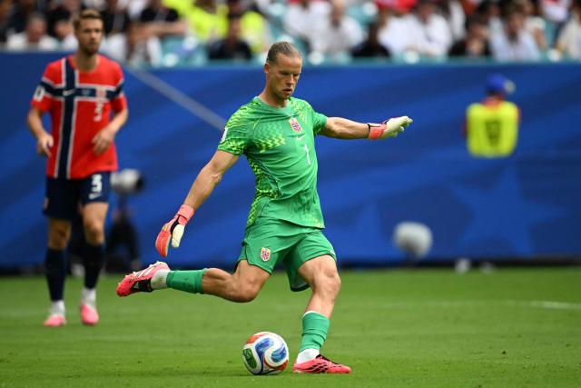 (FILES) Norway's goalkeeper #01 Orjan Nyland kicks the ball during the 2026 World Cup football tournament quarter-final match between Norway and England at Miami Stadium in Miami Gardens on July 11, 2026. RB Leipzig have signed Orjan Nyland, the club announced on August 4, 2026. The 35-year-old joins German first division club RB Leipzig on a free transfer after his contract with FC Sevilla expired and will wear the jersey number 1. The goalkeeper was previously under contract with RB Leipzig in the 2022/23 season. (Photo by MAURO PIMENTEL / AFP)