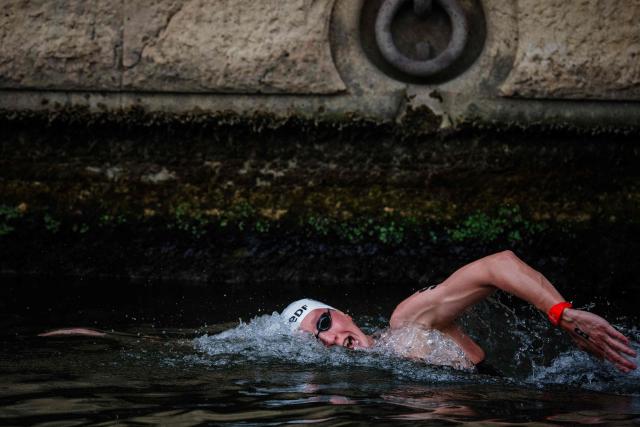 Germany's swimmer Florian Wellbrock competes in the men's 10km open water swimming event during the LEN European Aquatics Championships, in the Seine River in Paris, on August 4, 2026. (Photo by Dimitar DILKOFF / AFP)