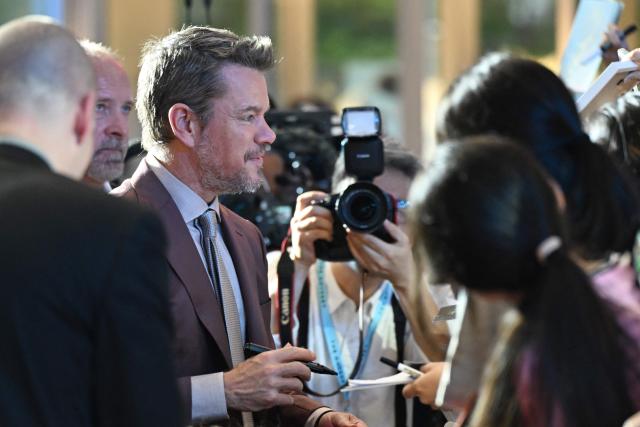 US actor Matt Damon signs autographs at a red carpet event for the film 'The Odyssey' in Seoul on August 4, 2026, ahead of its opening on August 5. (Photo by GREG BAKER / AFP)