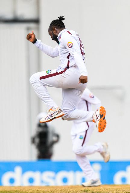 Jomel Warrican of West Indies celebrates the dismissal of Muhammad Awais Zafar of Pakistan during the third day of the second Test match between West Indies and Pakistan at Queen's Park Oval in Port of Spain, Trinidad and Tobago, on August 4, 2026. (Photo by Randy Brooks / AFP)