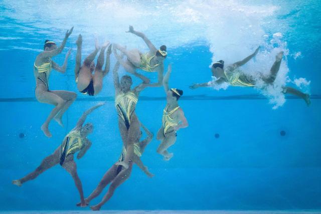 France's artistic swimmers compete in the team technical artistic swimming final event during the LEN European Aquatics Championships, at the Olympic Aquatics Centre in Saint-Denis, northeastern suburbs of Paris, on August 4, 2026. (Photo by Sébastien BOZON / AFP)