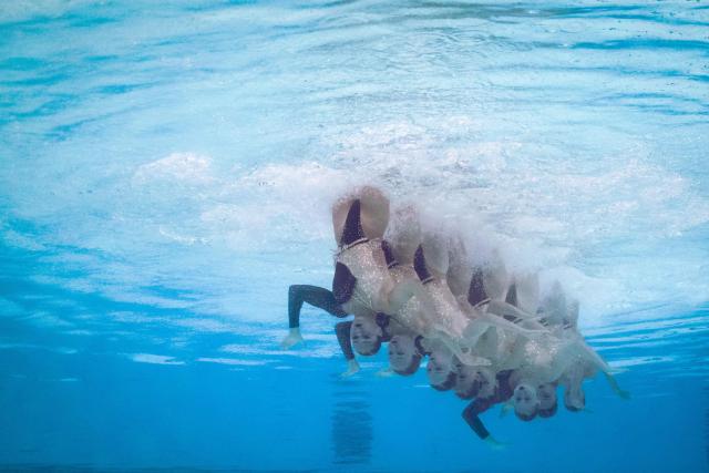 Neutral athletes artistic swimmers compete in the team technical artistic swimming final event during the LEN European Aquatics Championships, at the Olympic Aquatics Centre in Saint-Denis, northeastern suburbs of Paris, on August 4, 2026. (Photo by Sébastien BOZON / AFP)