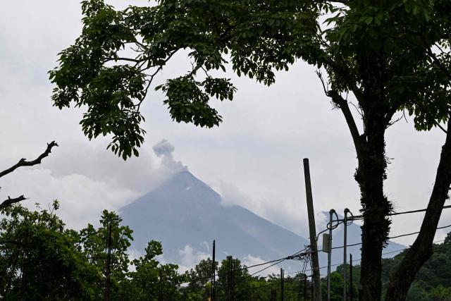 Fuego volcano erupts in Alotenango, some 65 kilometers southwest of Guatemala City, on August 4, 2026. Guatemalan authorities issued the country's second-highest emergency alert level on August 4 after a major eruption of Central America's most active volcano, prompting the evacuation of nearby villages. (Photo by Johan ORDONEZ / AFP)