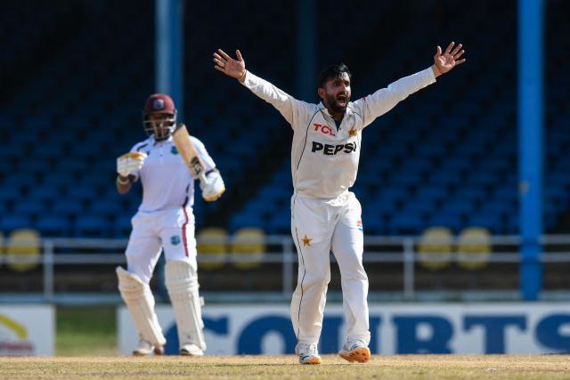 Ali Usman (R) of Pakistan appeals for LBW (leg before wicket) against Kavem Hodge (L) of West Indies during the third day of the second Test match between West Indies and Pakistan at Queen's Park Oval in Port of Spain, Trinidad and Tobago, on August 4, 2026. (Photo by Randy Brooks / AFP)