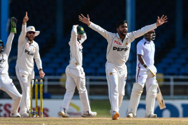 Ali Usman (2R) of Pakistan appeals for LBW (leg before wicket) against Kavem Hodge (R) of West Indies during the third day of the second Test match between West Indies and Pakistan at Queen's Park Oval in Port of Spain, Trinidad and Tobago, on August 4, 2026. (Photo by Randy Brooks / AFP)